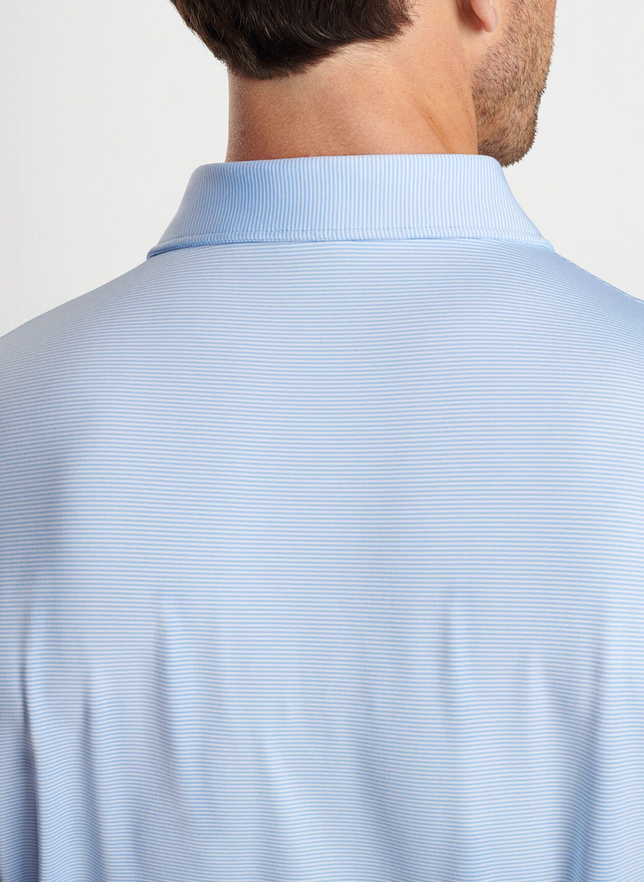 JUBILEE STRIPE PERFORMANCE POLO COTTAGE BLUE